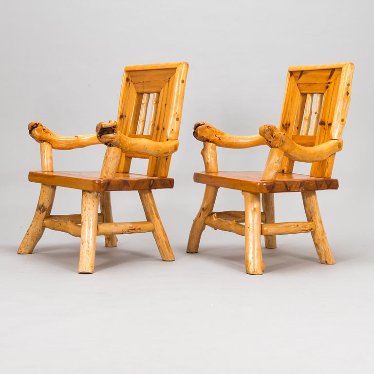 A pair of mid-20th-century armchairs made by Tauno Saarela Kuusamo Finland.