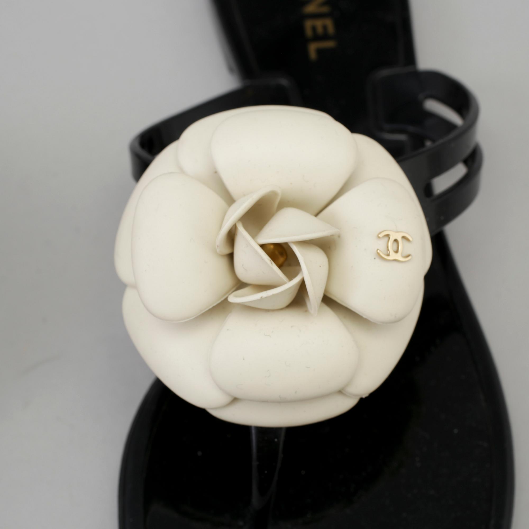 CHANEL, a pair of black plastic sandals. Size 38.
