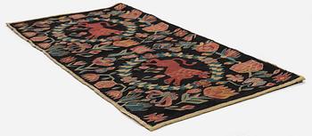 A cushion, 'Red Lion' (Rött Lejon), tapestry weave, c. 98 x 49 cm, Southwestern Scania, first part of the 19th century.