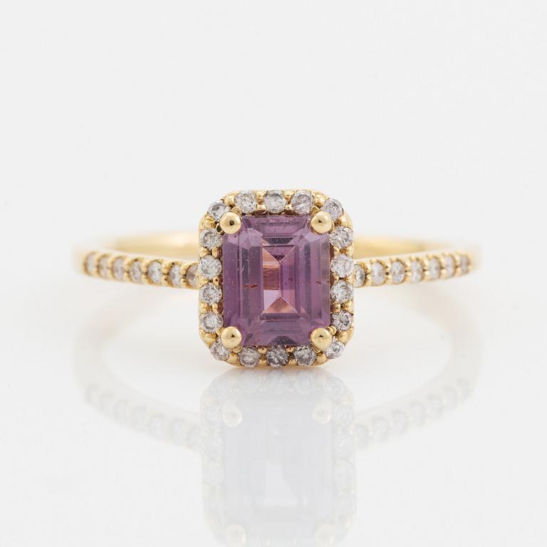 Emerald cut pink sapphire and brilliant cut diamond ring.