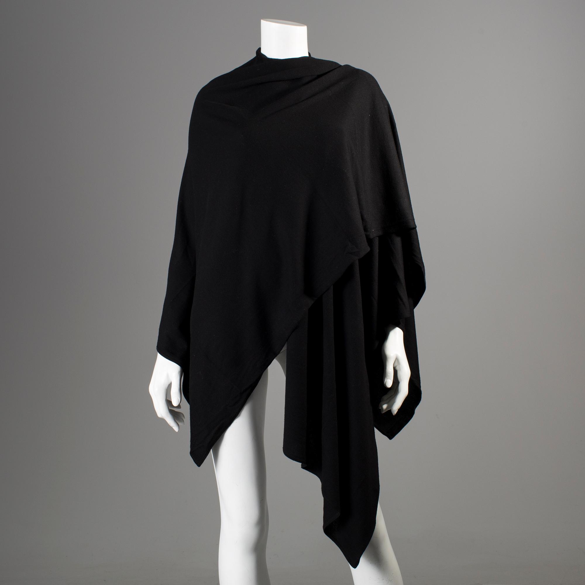 A black cottonponcho by Ralph Lauren.