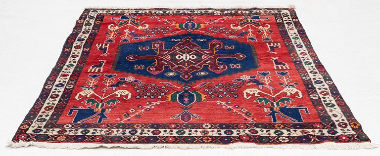 An oriental rug, c. 230 x 160 cm.