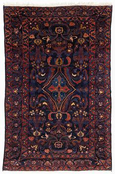 A semi-antique Khoigân village carpet, Feridan area, ca 314 x 209 cm.