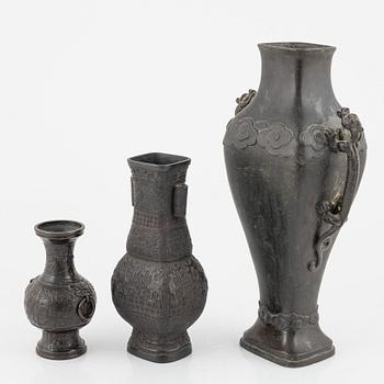 Three bronze vases, China, 19th century.