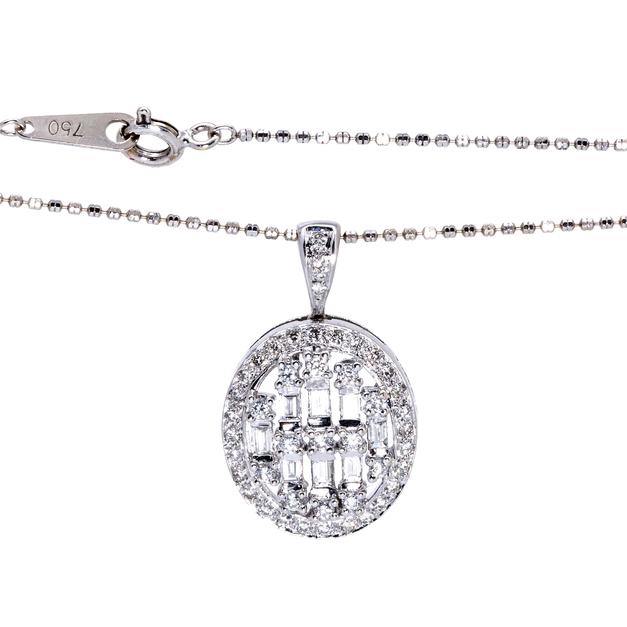 Pendant and chain, 18K whitegold, brilliant and baguette-cut diamonds approx 0,75 ct in total.