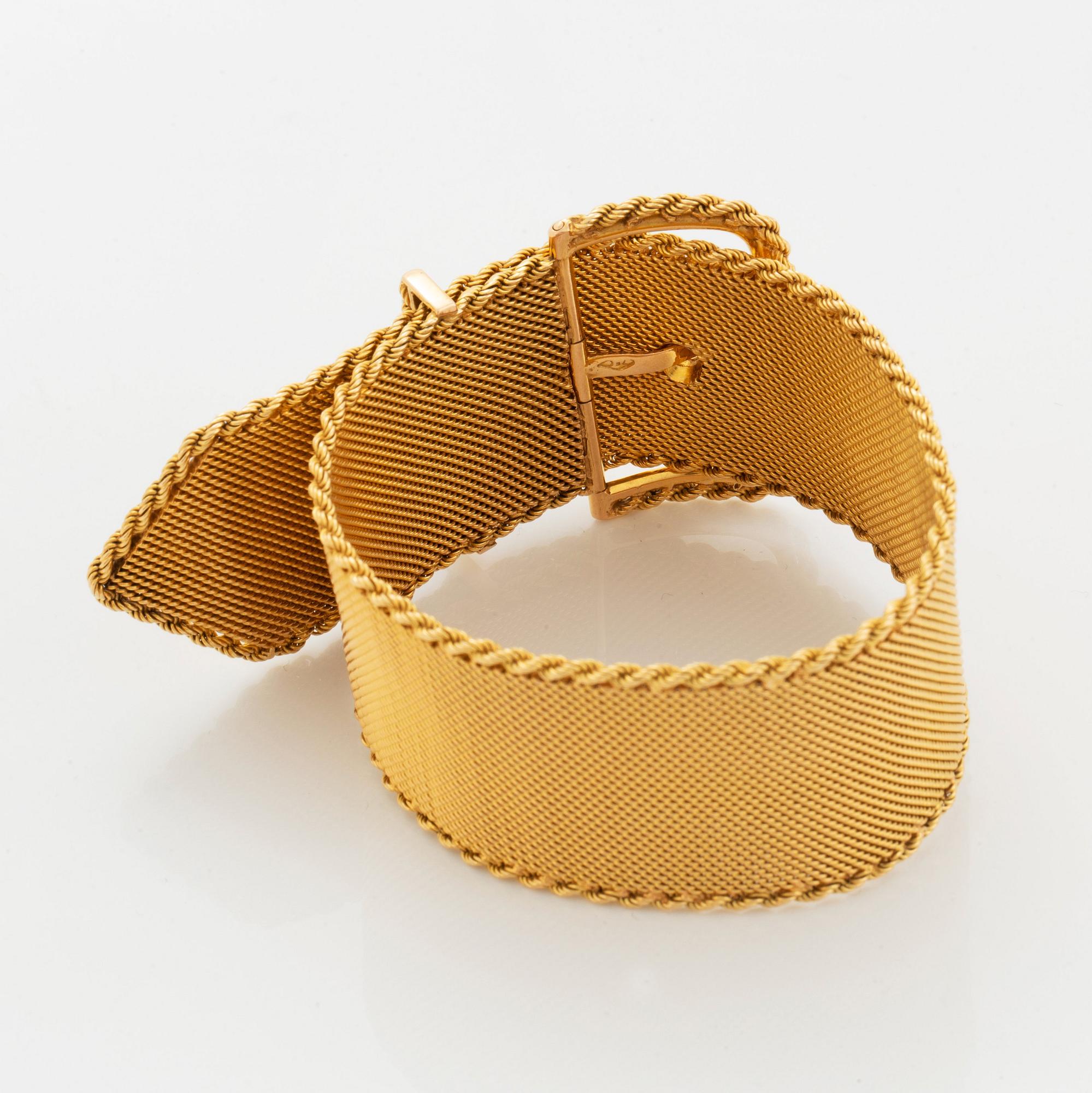 Armband 18K guld i form av ett bälte.