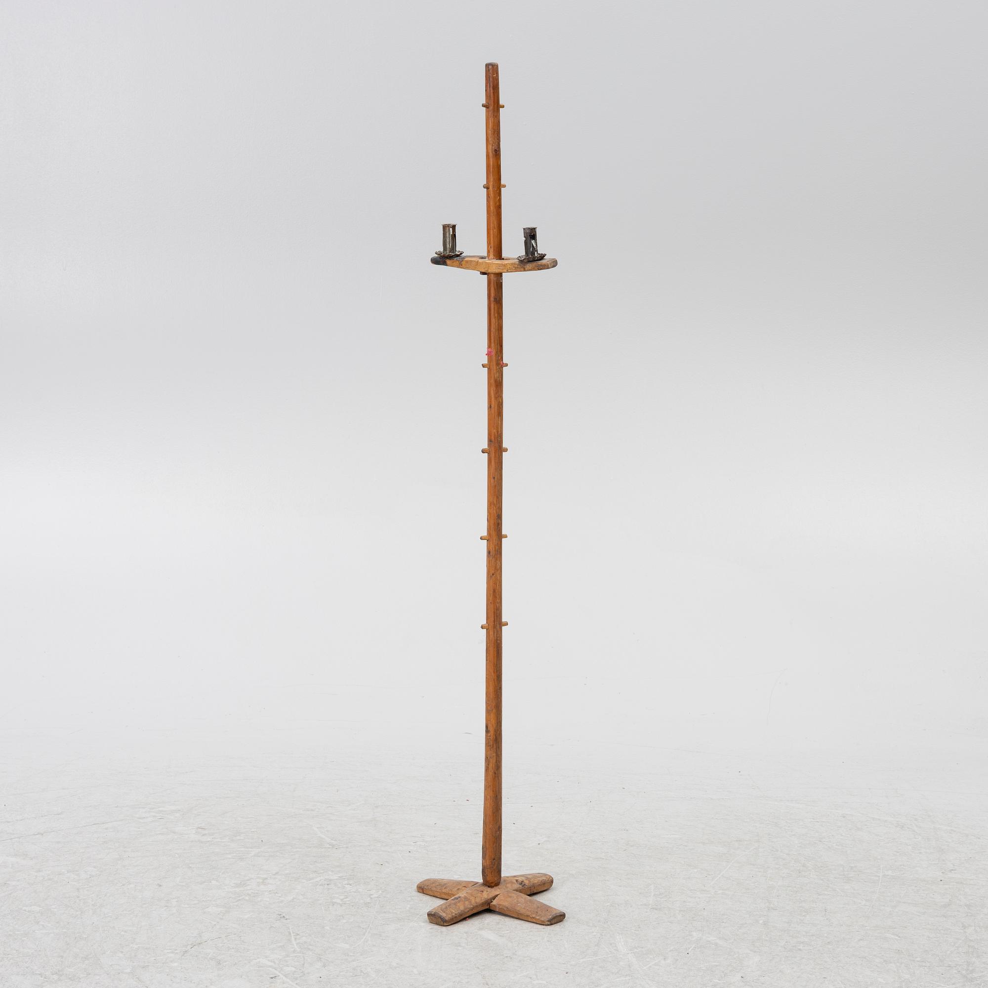 A floor candlestick, 19th Century.