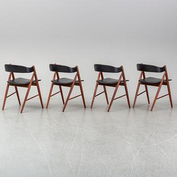 Four 1960s teak chairs.
