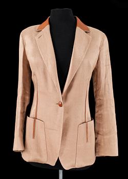 A beige linen jacket by Hermès.