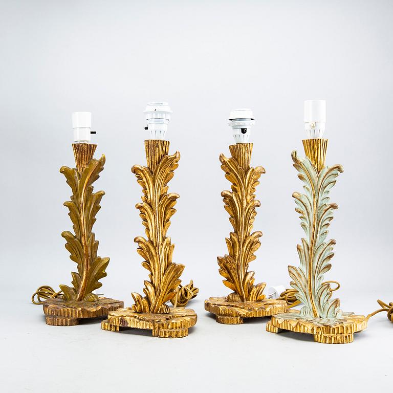 A set of four wood table lamps from Paoletti, Firenze Italy, second half of 20th century.