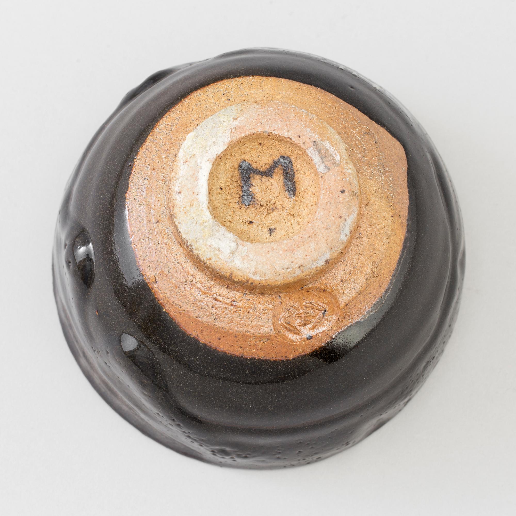 A Japanese Raku stoneware bowl, 20th century.