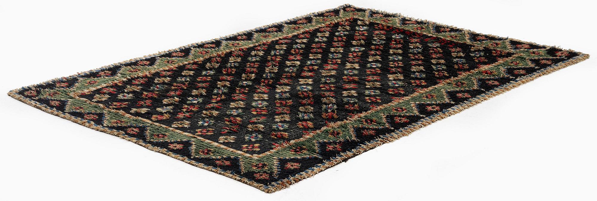 A Knotted pile (rya), c. 200 x 140 cm, Finland, dated 1849.