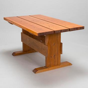 A mid-20th century dining table.
