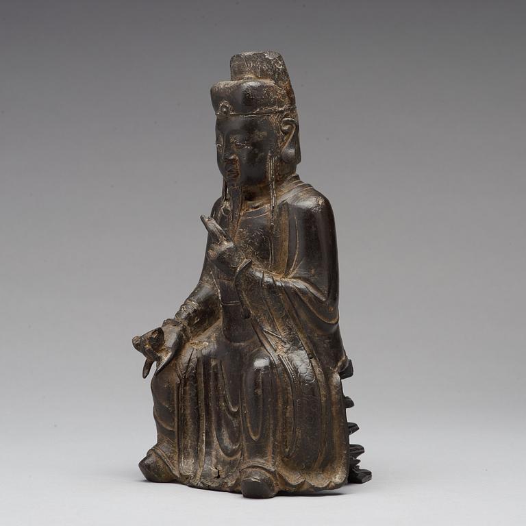 A bronze sculpture of a daoist dignitary, Ming dynasty (1368-1644).