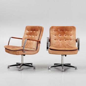 Kenneth Bergenblad, a pair of leather upholstered armchairs from Dux, designed 1978.