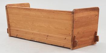 An Axel Einar Hjorth 'Lovö' stained pine sofa, Nordiska Kompaniet, Sweden 1930's.