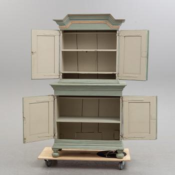 A 19th century painted cabinet.