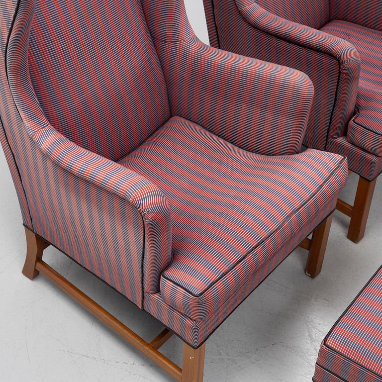Kaare Klint, a pair of model 6212 armchairs with ottomans, Rud Rasmussen, Denmark.