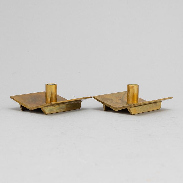 Pierre Forssell, a set of five brass 'Profil' candlesticks from Skultuna.