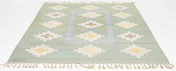 A flat weave carpet, signed GK, Sweden, c. 243 x 171 cm.