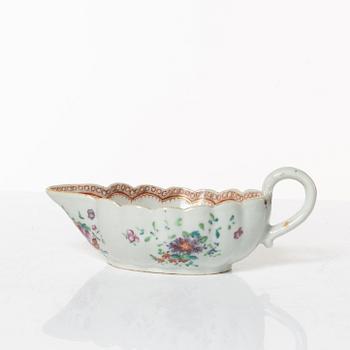 A group of 14 Chinese porcelain dessert dishes and a famile rose sauce boat, Qing dynasty, Qianlong (1736-95).