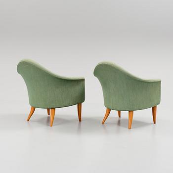 A pair of "Lilla Adam" armchairs by Kerstin Hörlin-Holmquist för Nordiska Kompaniet.