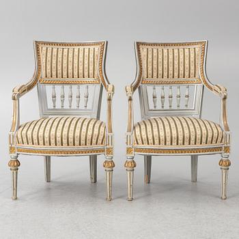 A pair of Gustavian style armchairs, 19th Century.