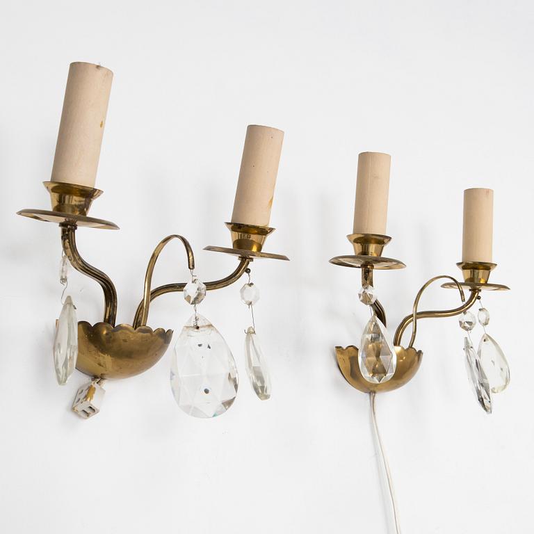 Four of mid-20th century wall sconces.