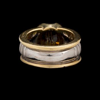 An 'On track' ring by Jan Jörgensen for Georg Jensen set with a fantasy cut citrine, ca 1980's.
