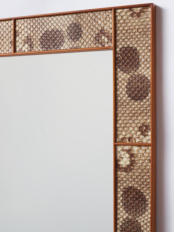 Josef Frank, a snakeskin framed mirror, Firma Svenskt Tenn, Sweden, executed in 1940.