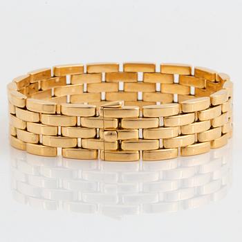 An 18K gold Cartier bracelet "Maillon Panthere".