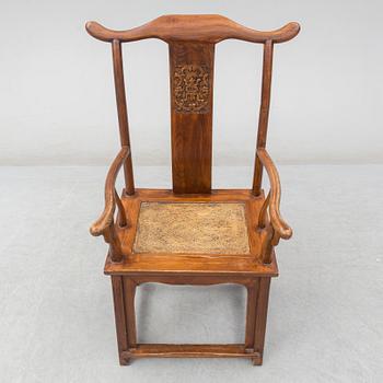 A Chinese wooden armchair, 20th century.