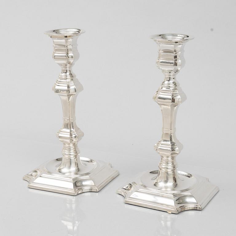 Pedro Duran, a pair of Baroque style sterling silver candle sticks, Spain.
