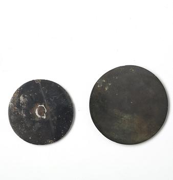 Two bronze mirrors, Han dynasty (206 B.C. - 220 A.D.).