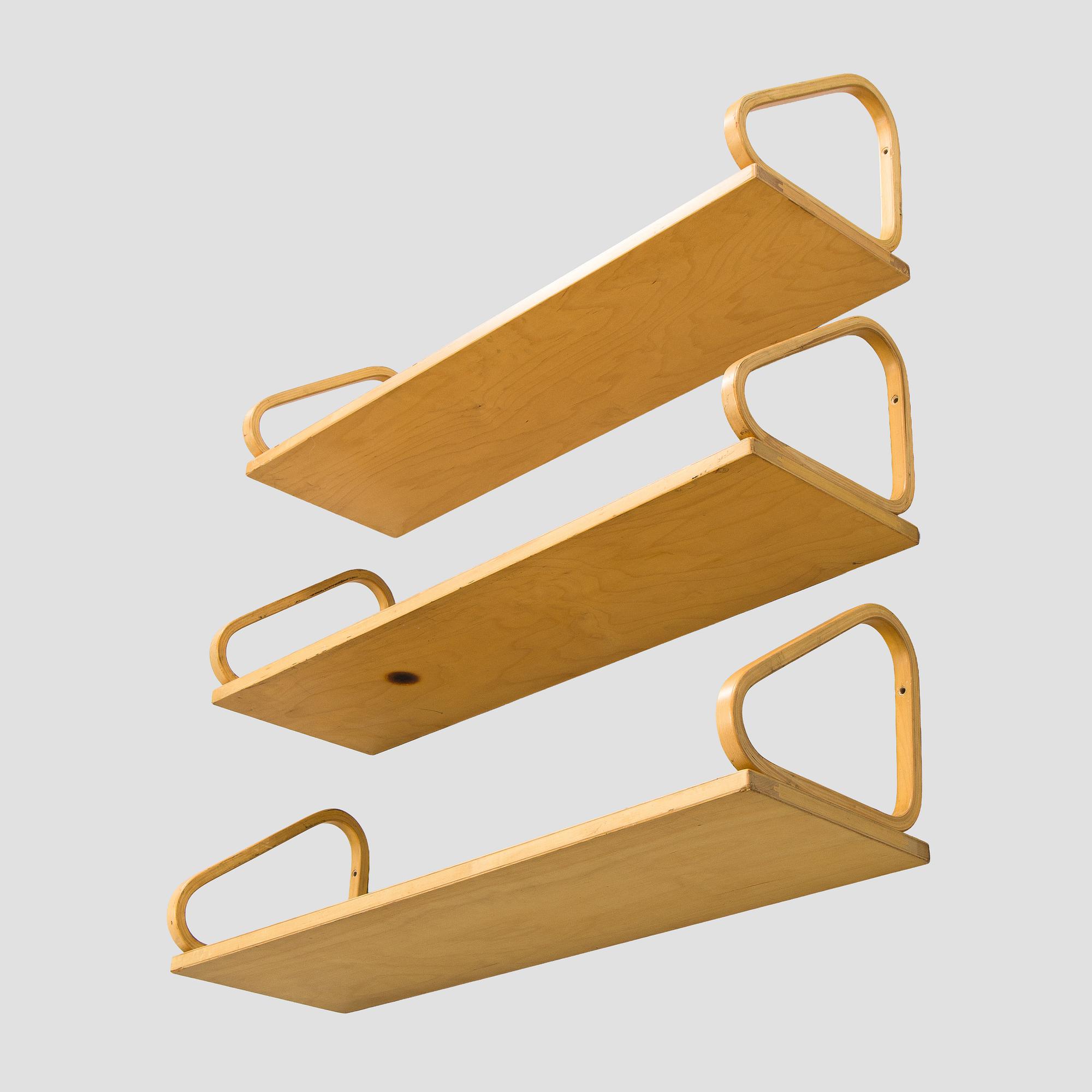 Alvar Aalto, three '112B' shelves, Artek, late 20th century.