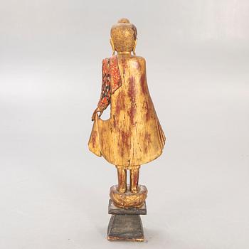 A gilde wooden Buddha first half of the 20th century.