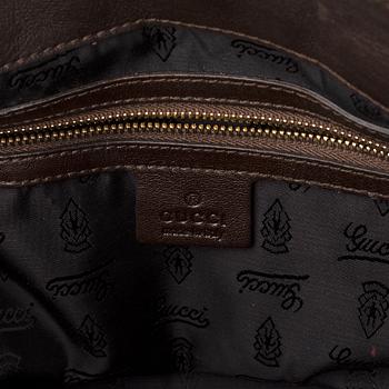 Gucci, a suede bag.
