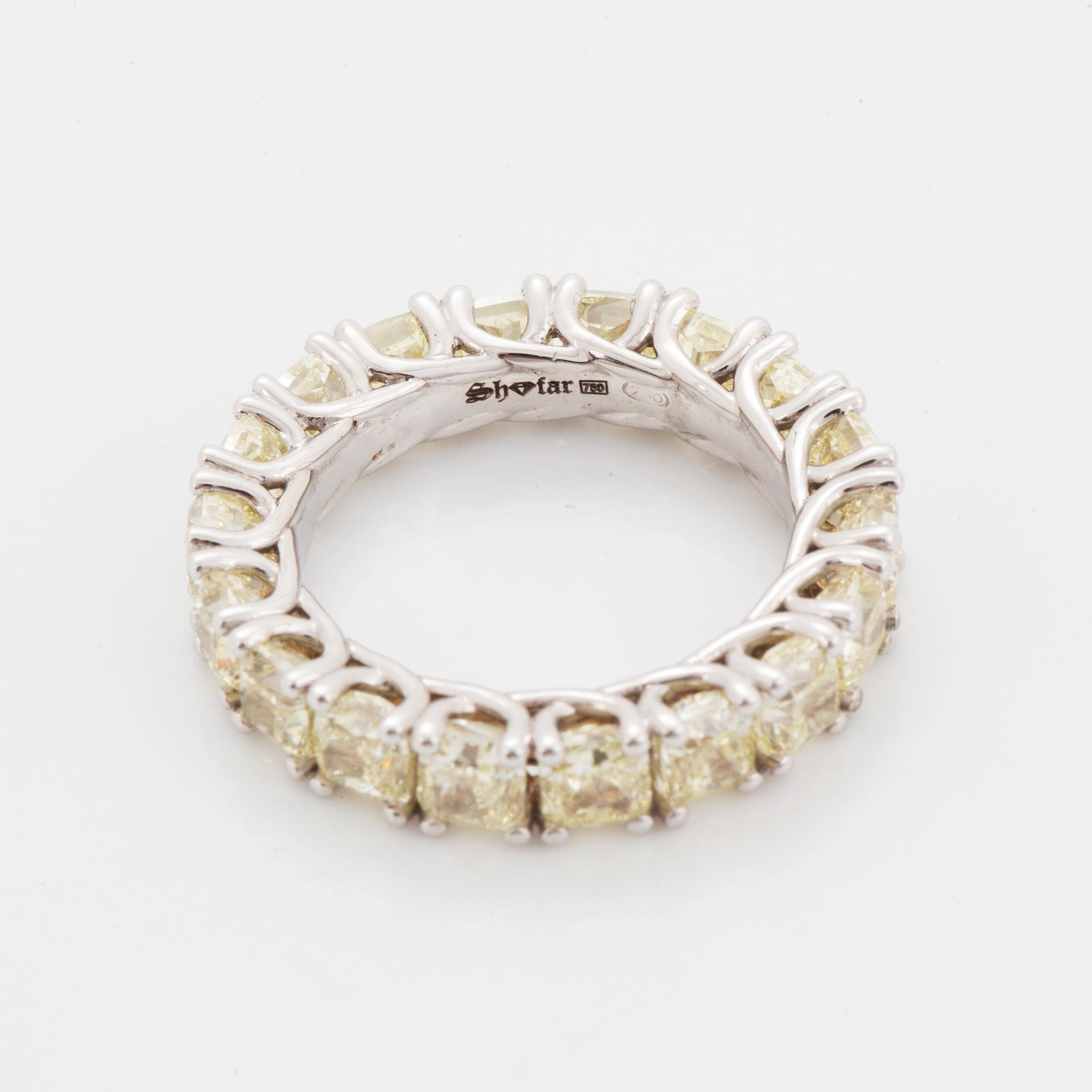 Cuschion-cut diamond eternity ring.