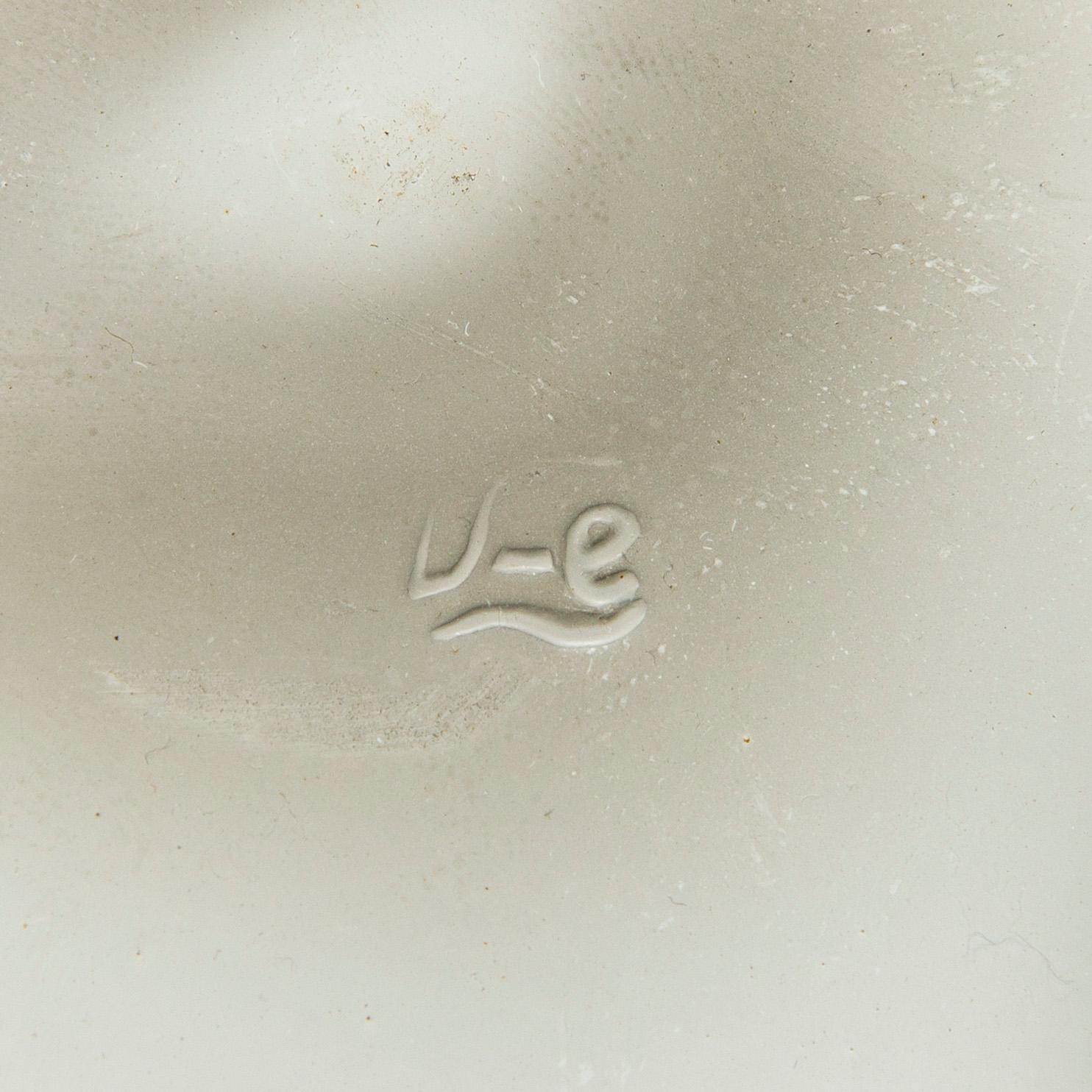 A mid-20th century ceiling light by Valinte.