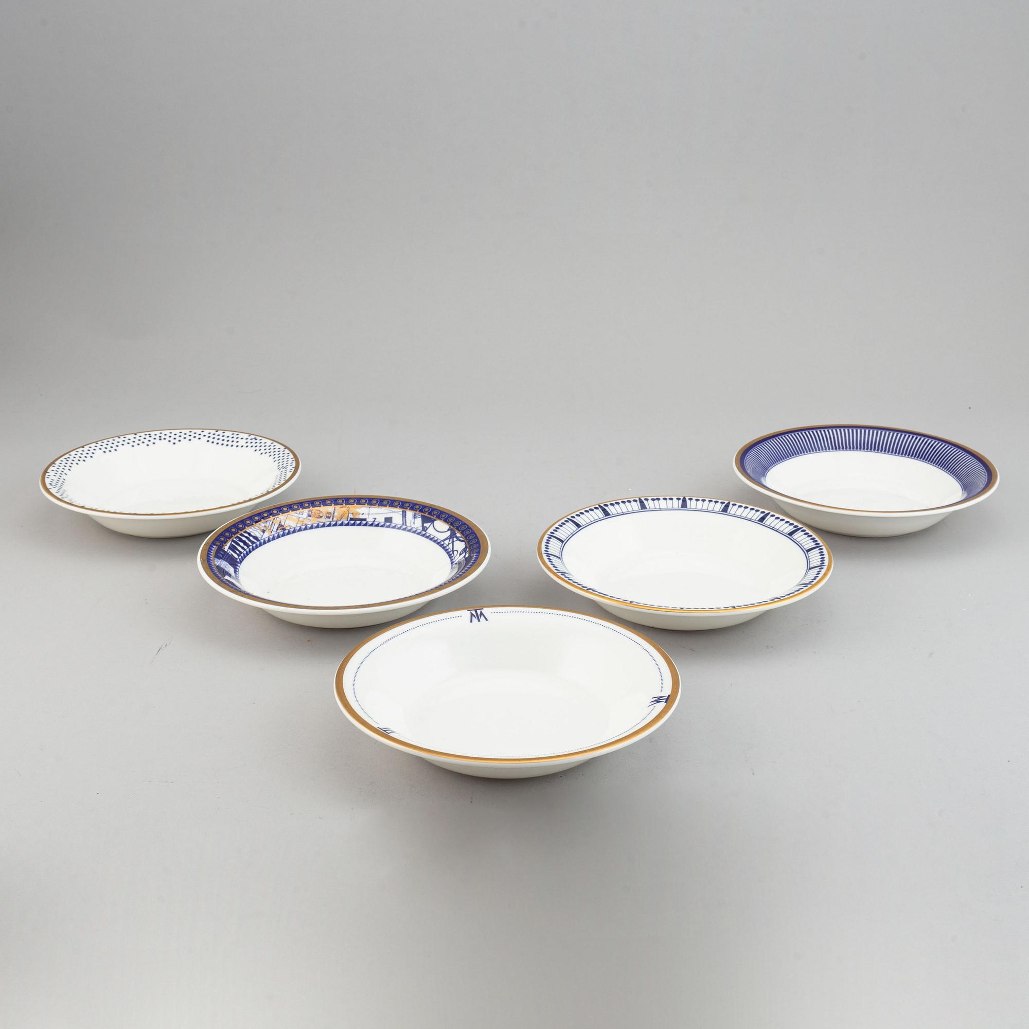 A 24 pcs bone china service from Flux Stoke on Trent, different motives and designers, designed in 2012. England.