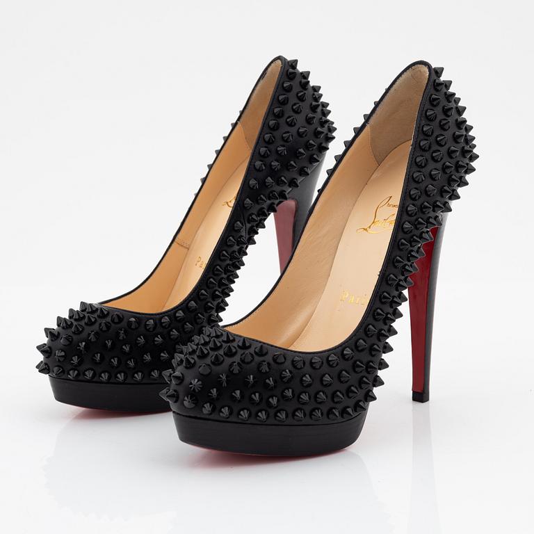 Christian Louboutin, a pair of black leather and studs pumps, size 36 1/2.