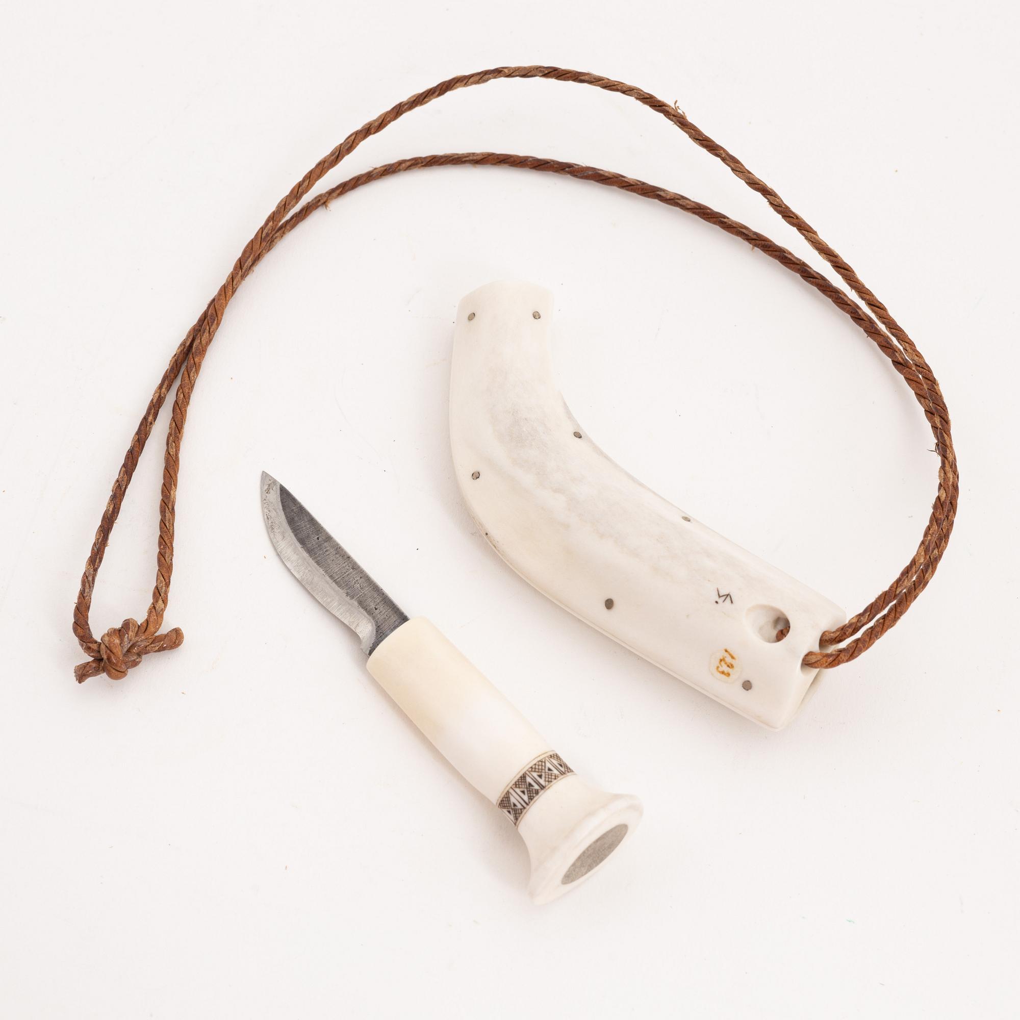 A small reindeer horn knife by Sune Enoksson, signed.