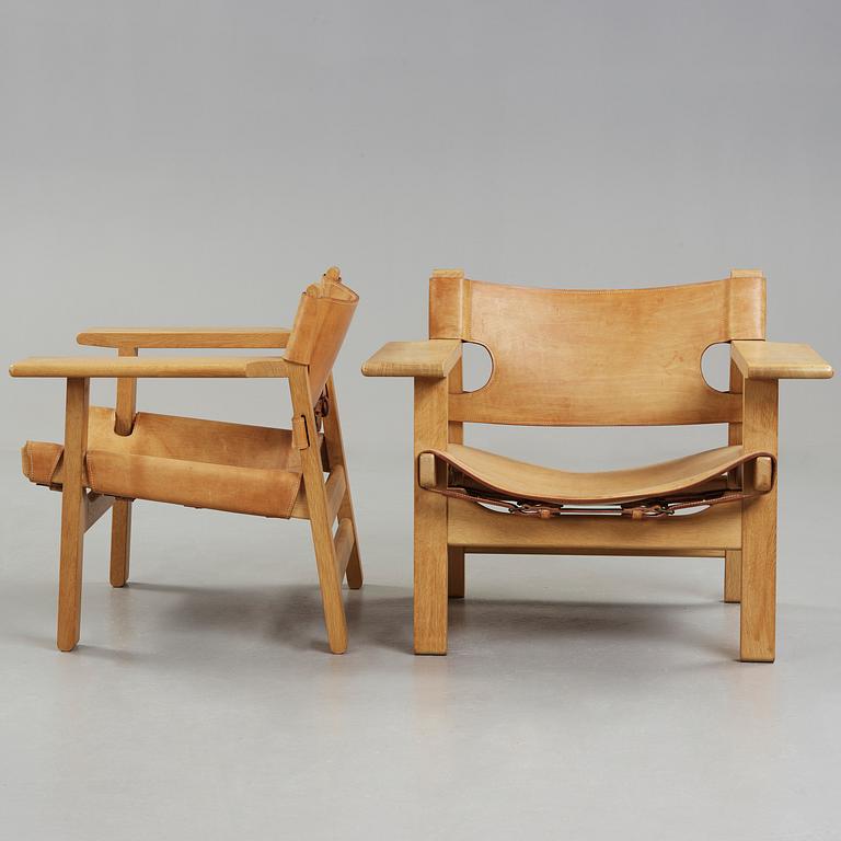 A pair of Børge Mogensen oak and leather 'Spanish Chair', Fredericia Møbelfabrik, Denmark.