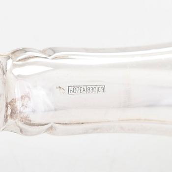 A 78-piece silver 'Chippendale' cutlery set, 1978-2007. Various Finnish manufacturers.