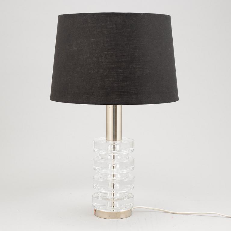 Carl Fagerlund, a glass and metal table lamp, Orrefors, second half of the 20th century.