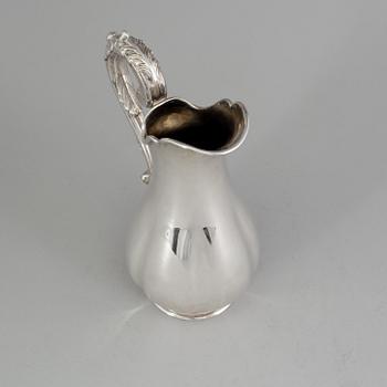A Swedish silver water pitcher, maker's mark Gustaf Theodor Folcker, Stockholm, 1860. Weight 647 g.