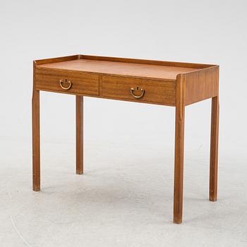 Josef Frank, attributed to, a mahogany veneered side table, Firma Svenskt Tenn, Sweden, mid 20th century.