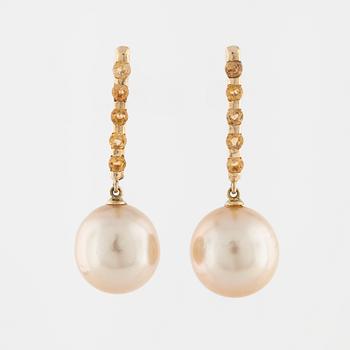 A pair of cultured pearl and faceted citrine earrings.