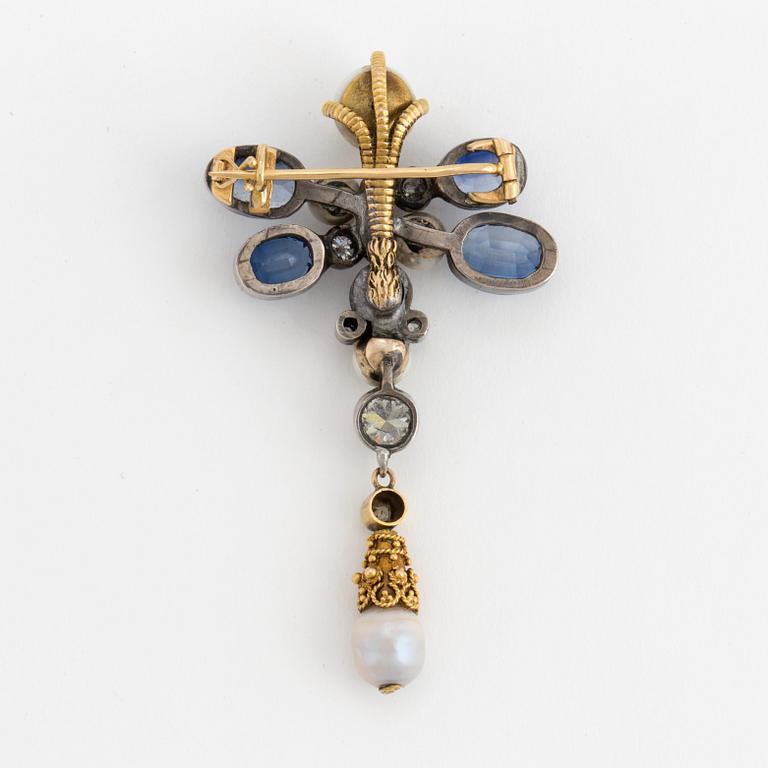 A brooch set with old-cut diamonds. fresh-water pearls and synthetic sapphires.