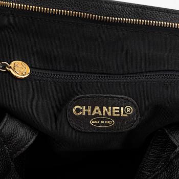 Chanel, a caviar leather tote bag.